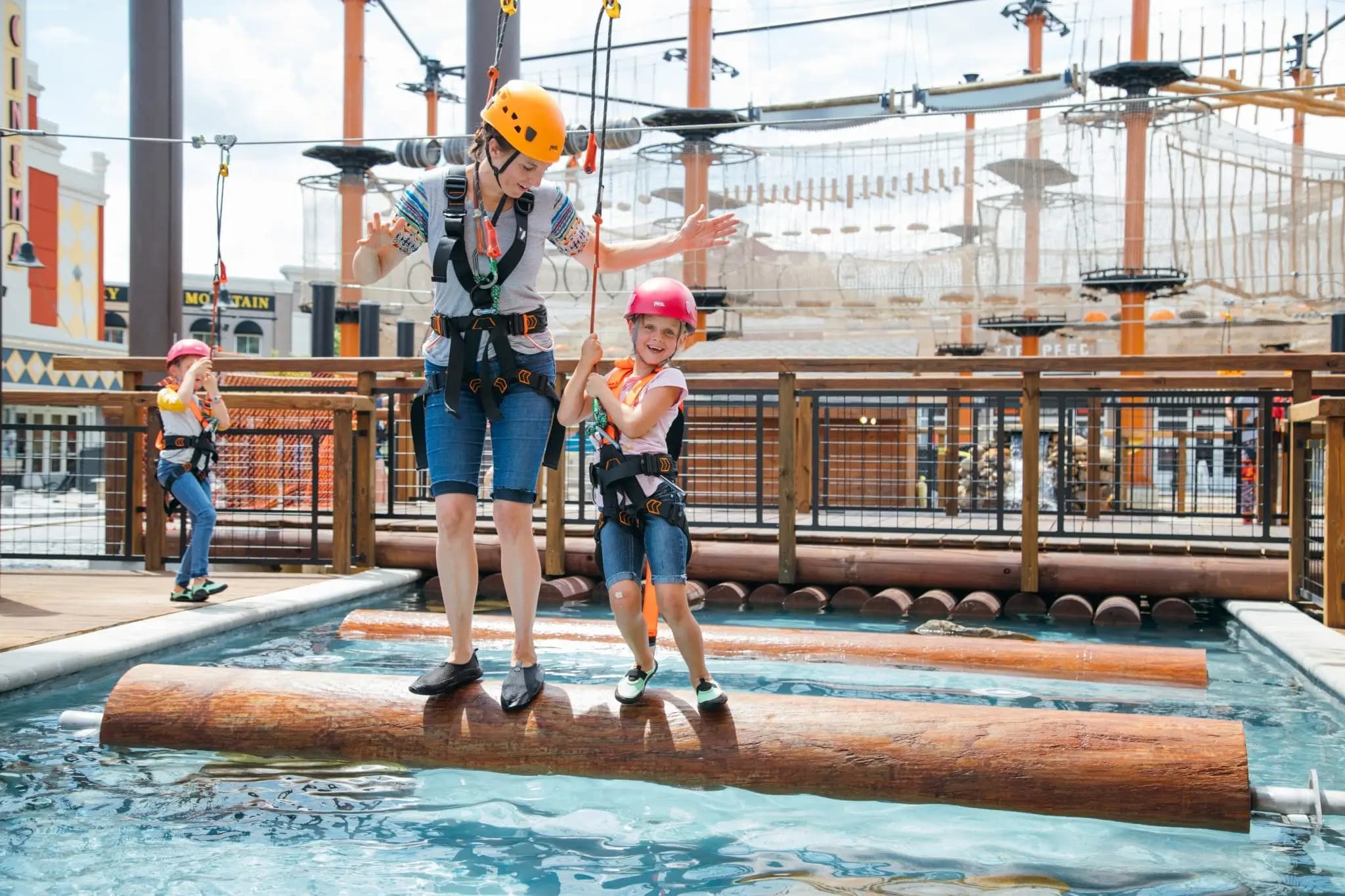 Blog - Lumberjack Feud - Kids on Log Roll over Water