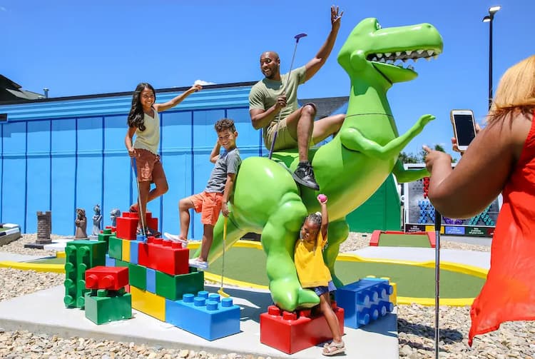 Photo - Man on ToyBox Golf CLub Dino